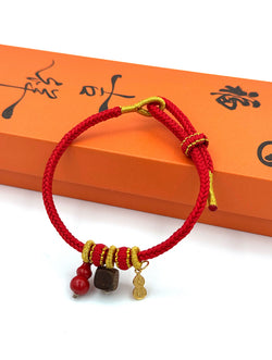 "Infinite Peace & Flow" Agarwood & Cinnabar Red Cord Bracelet | Gourd Charm