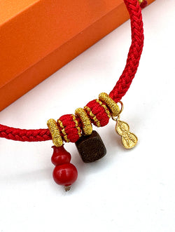 "Infinite Peace & Flow" Agarwood & Cinnabar Red Cord Bracelet | Gourd Charm