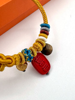 "Abundance Flow" Agarwood & Cinnabar Woven Bracelet | Gold Ingot