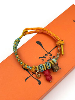 "Leaping Koi" Cinnabar & Agarwood Woven Bracelet | Koi Fish Charm